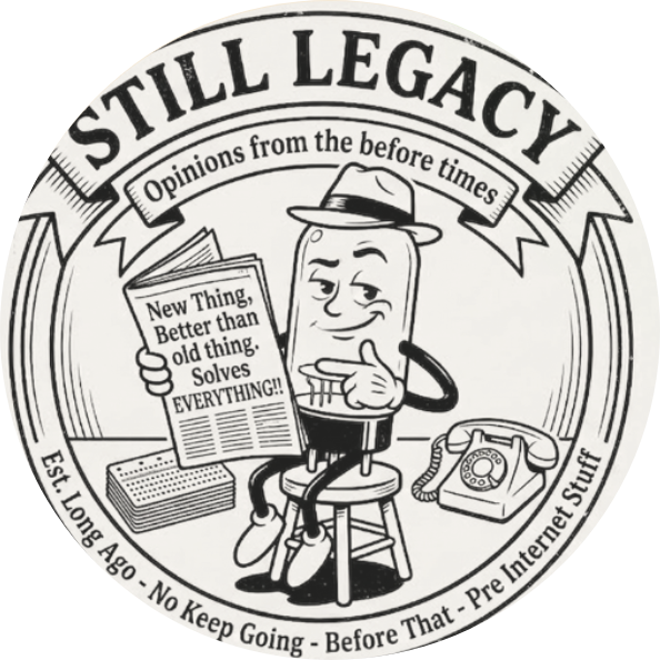 Still Legacy badge: a cartoon vacuum tube in a fedora reading a newspaper headlined New Thing, Better than old thing, Solves everything, beside a rotary phone